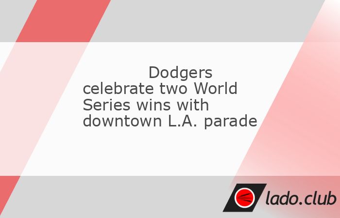  For the first time in 36 years, Los Angeles held a championship parade for the Dodgers.,Tens of thousands of fans lined the streets of downtown Los An 